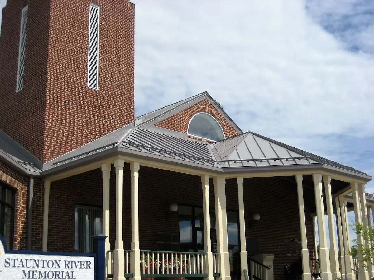 Skilled roofing craftsmen working on a residential roof in Dadsville